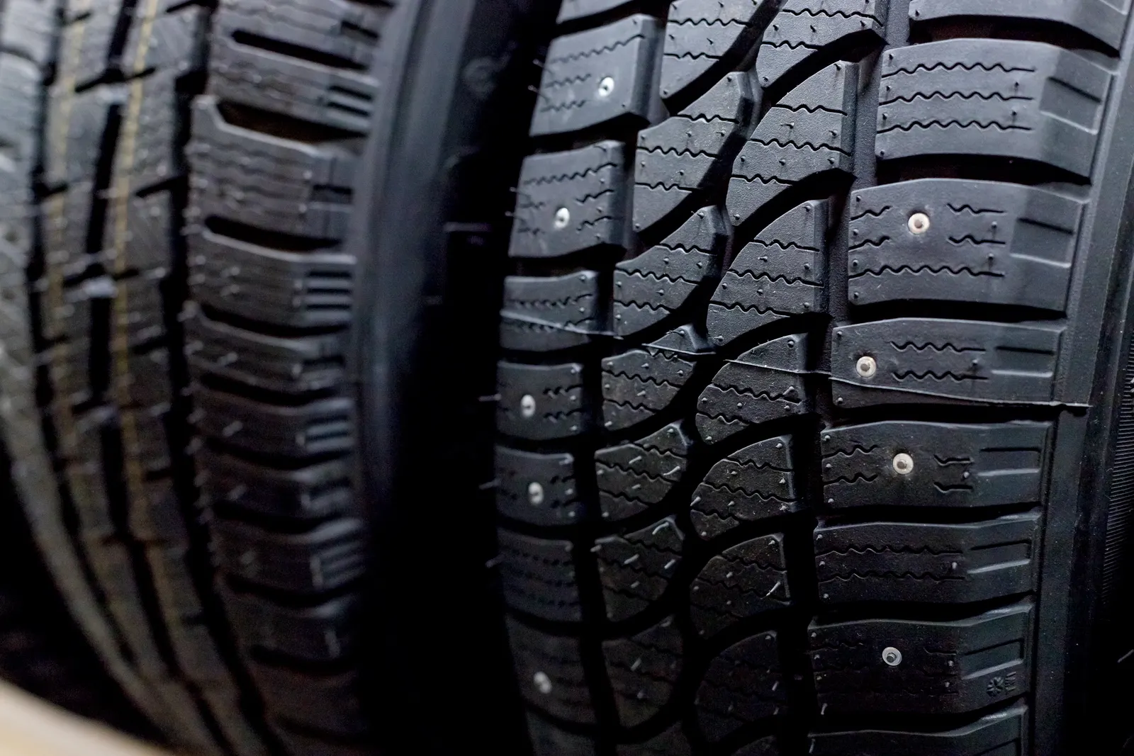 Metal studs on a studded winter tyre