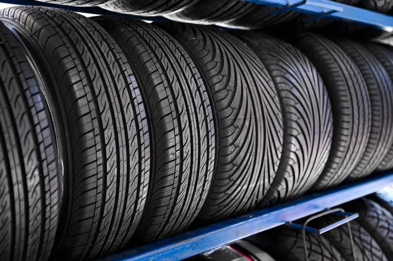 New tyres lined up on the stockroom shelves